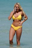 amber-turner-shows-off-her-beach-body-in-a-yellow-bikini-while-on-holiday-in-dubai-090318_3.jpg