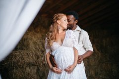 yinterracial-couple-expecting-baby-dressed-rustic-style-standing-barn-african-men-hugs-his-pre...jpg