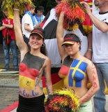 Topless_body-painted_female_football_fans_at_World_Cup_in_Germany-24June2006.jpg